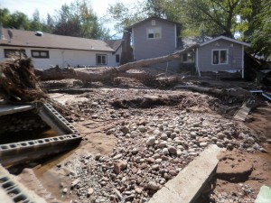 House on the right was moved off its foundation, in front of me used to be a driveway. None of these rocks were here a month ago, 9/29/13.