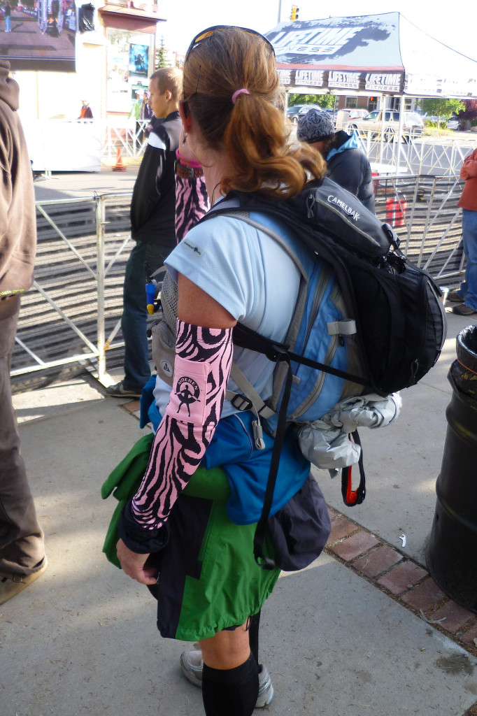 Pacer at the Leadville 100 carrying both her own pack AND her runner's pack. Muling is allowed at Leadville.