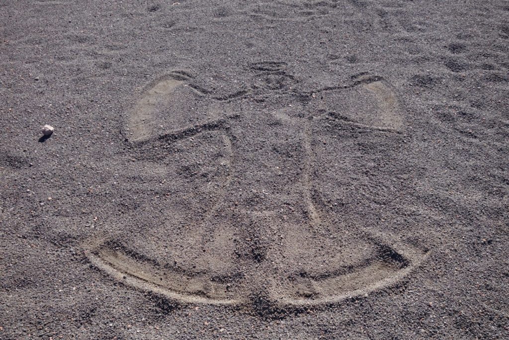 When there is no snow a volcanic sand angel is an acceptable alternative.